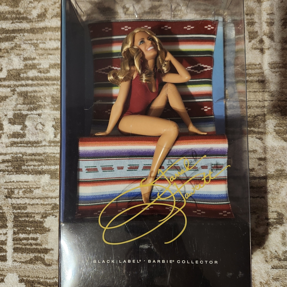 Farrah Fawcett in Red Swimsuit on Serape Chair